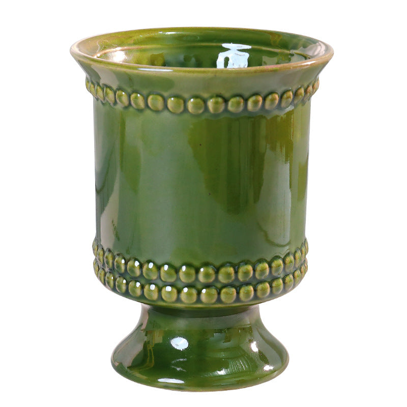 High-legged ceramic perforated flowerpot