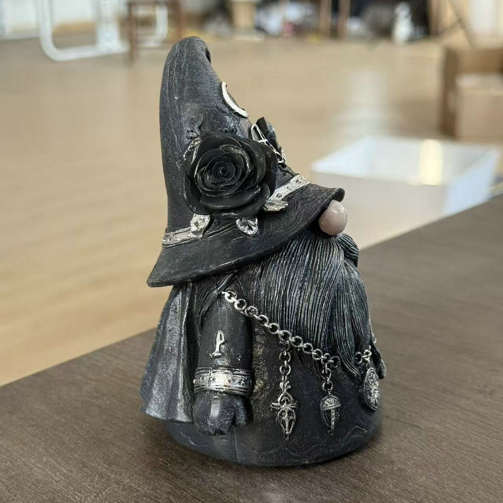 Tiny resin figurine of a dwarf
