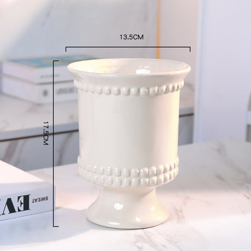 High-legged ceramic perforated flowerpot