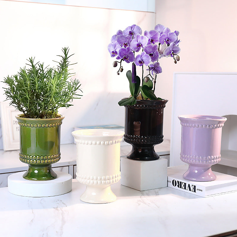 High-legged ceramic perforated flowerpot