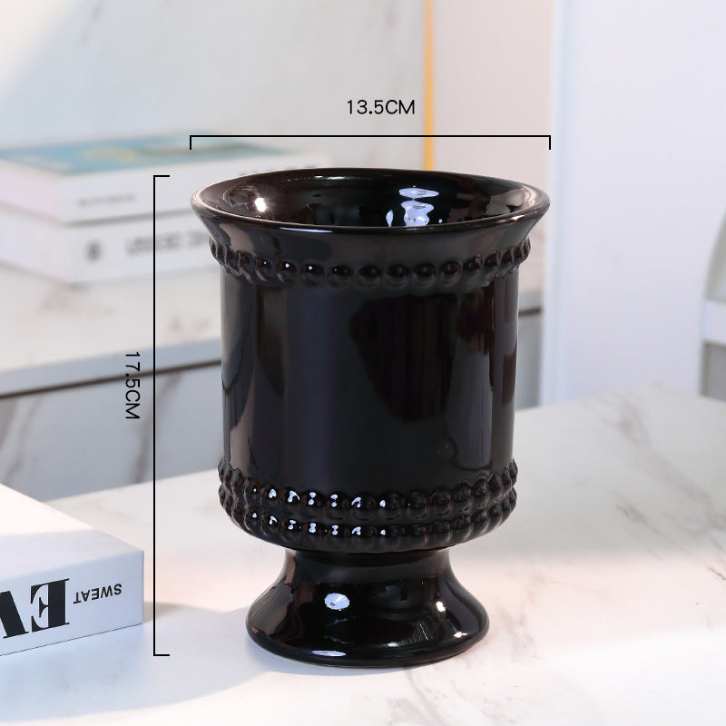 High-legged ceramic perforated flowerpot
