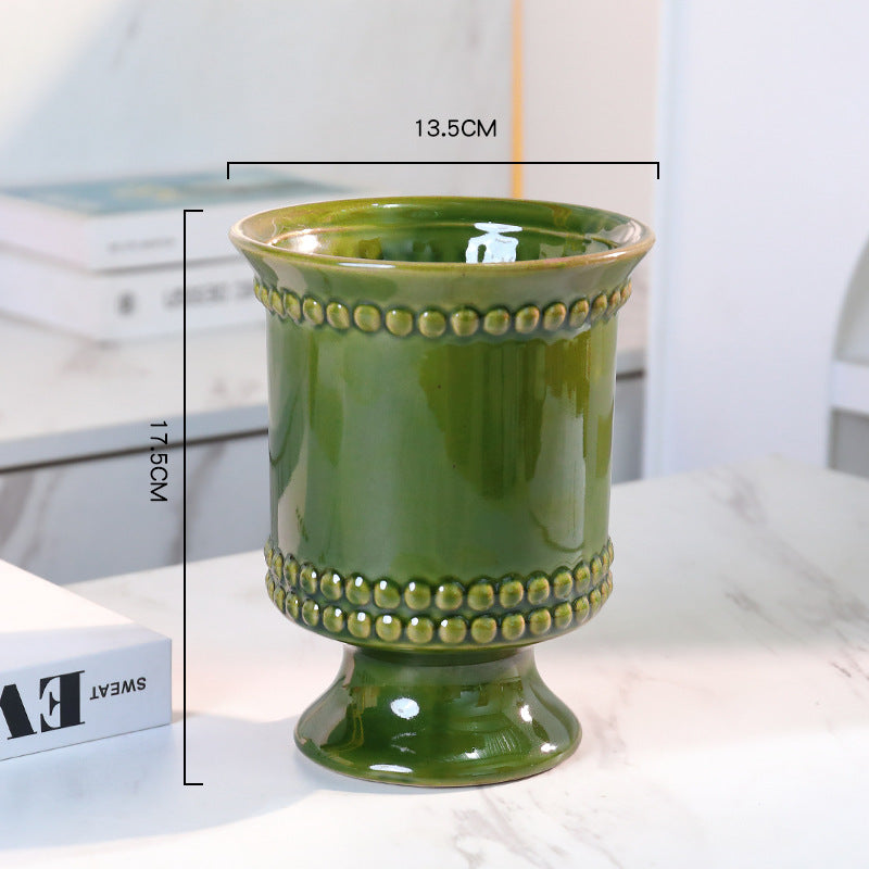 High-legged ceramic perforated flowerpot